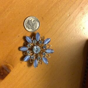 Pale Blue Flower Brooch with Sparkling Center